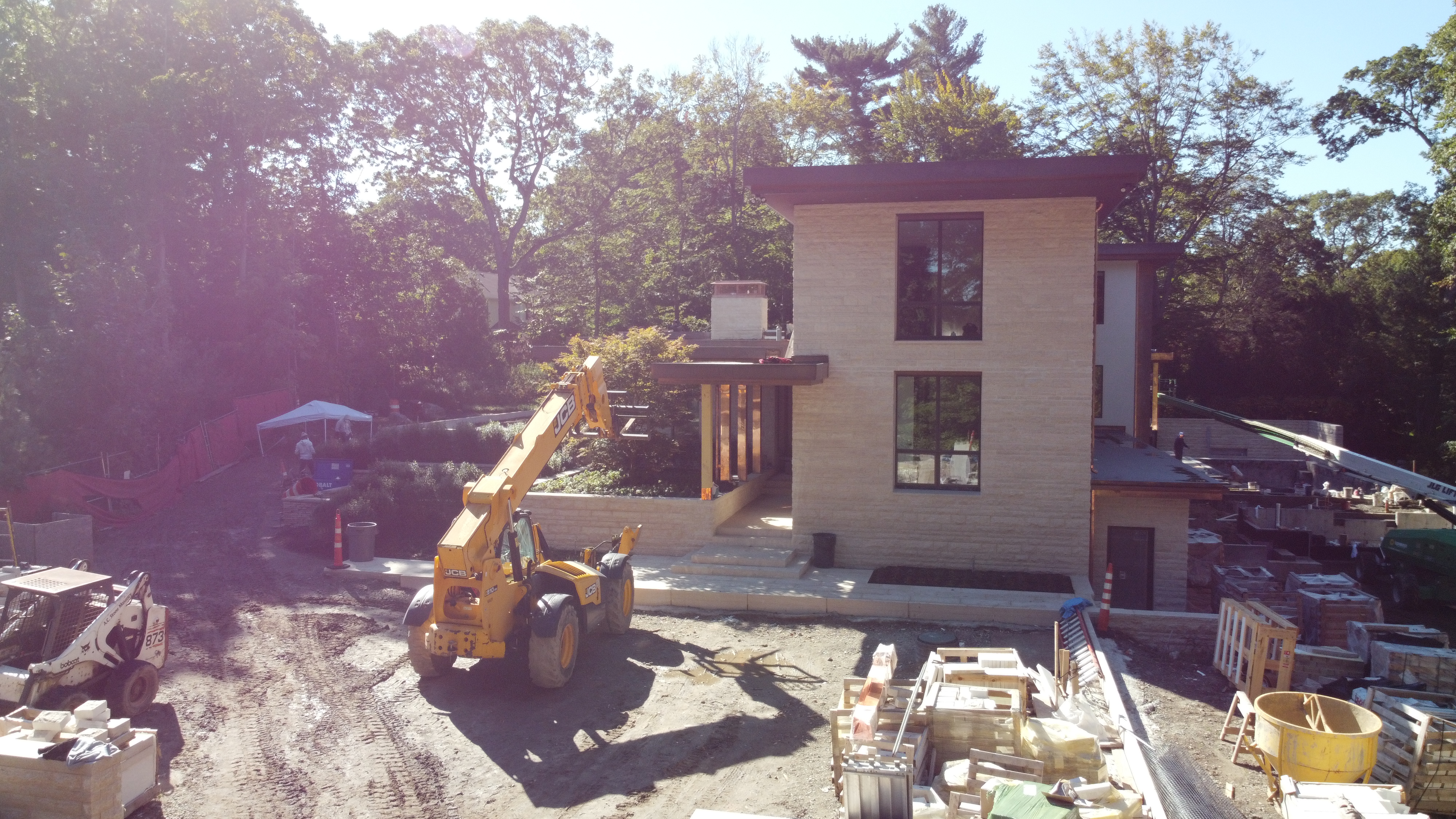 Sargent Beechwood luxury home side elevation and landscaping in Brookline, MA, managed by Omega Permits